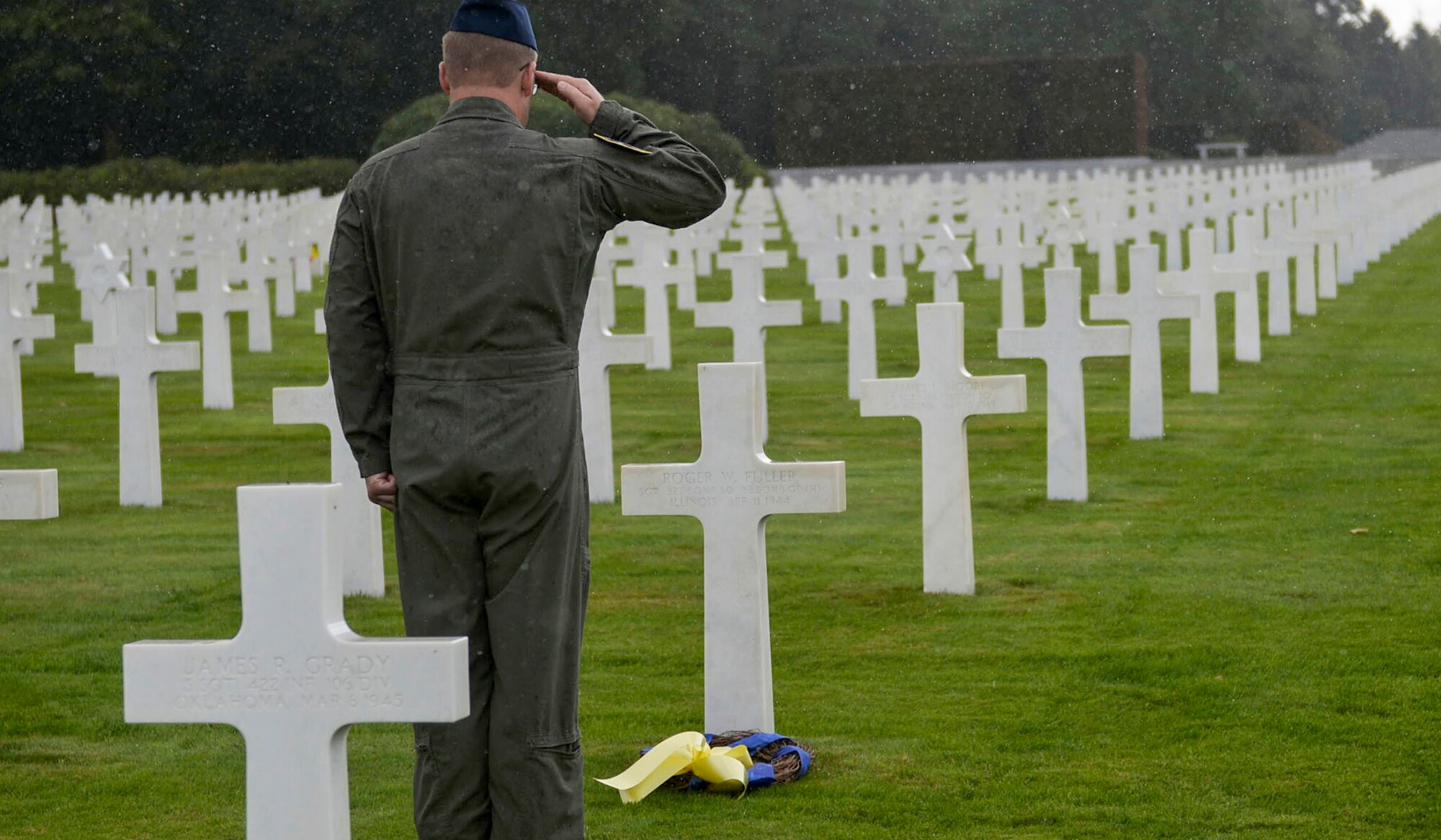 U.S. Air Force Reserve Master Sgt. Scott Klobucher, a loadmaster assigned to the 327th Airlift Squadron, 913th Airlift Group, places the final wreath of the day at Ardennes American Military Cemetery in Neupre, Belgium, Sept. 12, 2017. Klobucher placed the wreath on the grave of Staff Sgt. Roger W. Fuller, 327th Bomb Squadron, 92 Bomb Group, Illinois, who died April 11, 1944. (U.S. Air Force photo by Airman 1st Class Codie Collins)