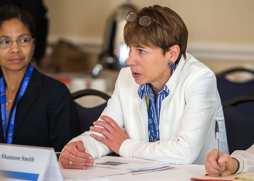 Shannon Smith, professor of practice and director of community engagement at National Defense University, talks with women military and diplomatic leaders.