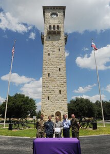 Leaders from across Joint Base San Antonio sign a Domestic Violence Awareness Month proclamation Aug. 30, 2017, at JBSA-Fort Sam Houston.