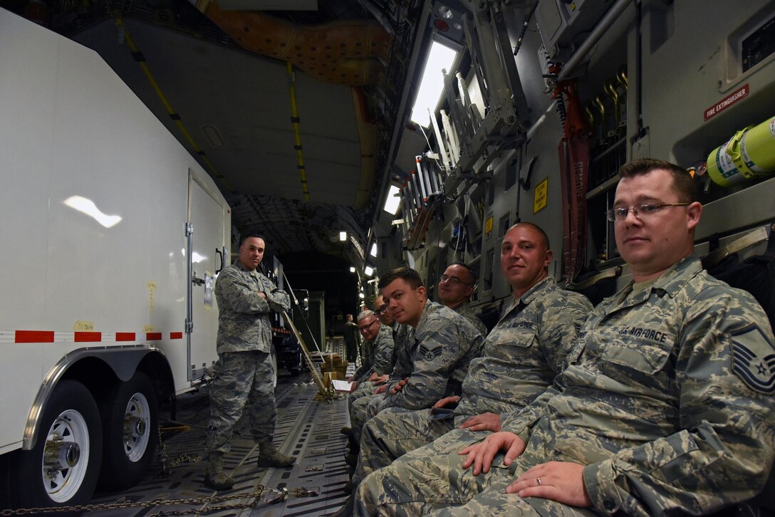 Airmen from the 105th Airlift Wing stand by with a Joint Incident Site Communications Capability system in a C-17 Globemaster III aircraft at Stewart Air National Guard Base, New York.