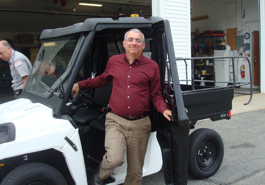 Sean McDonald tests electric car.