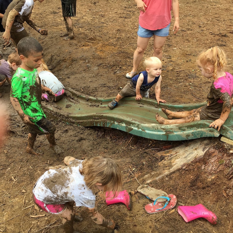 Children playing in mud