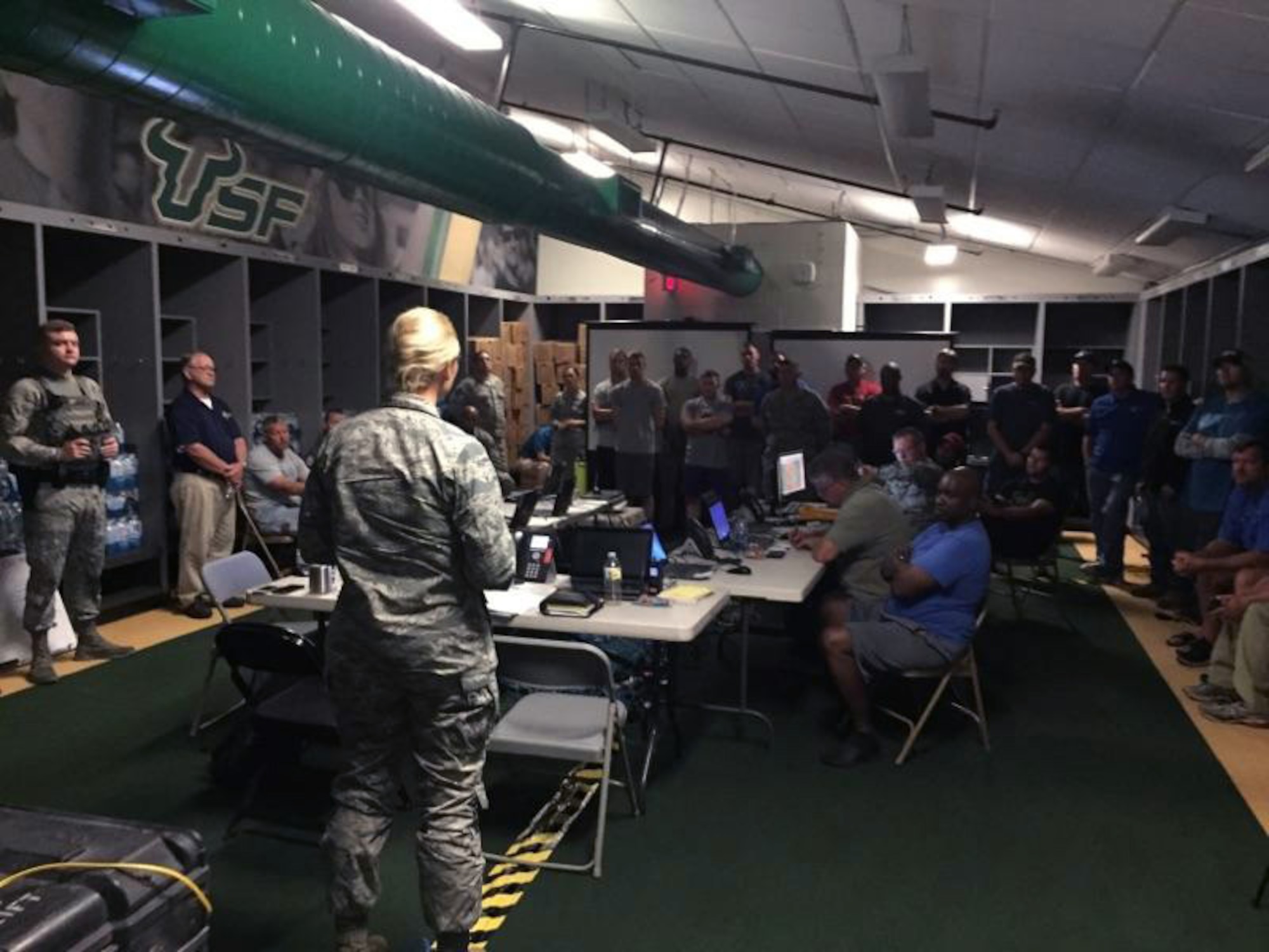 U.S. Air Force Col. April Vogel, commander of the 6th Air Mobility Wing, speaks to the Hurricane Ride-Out Team during Hurricane Irma in the locker room at Raymond James Stadium, Tampa, Fla, Sept. 9, 2017.