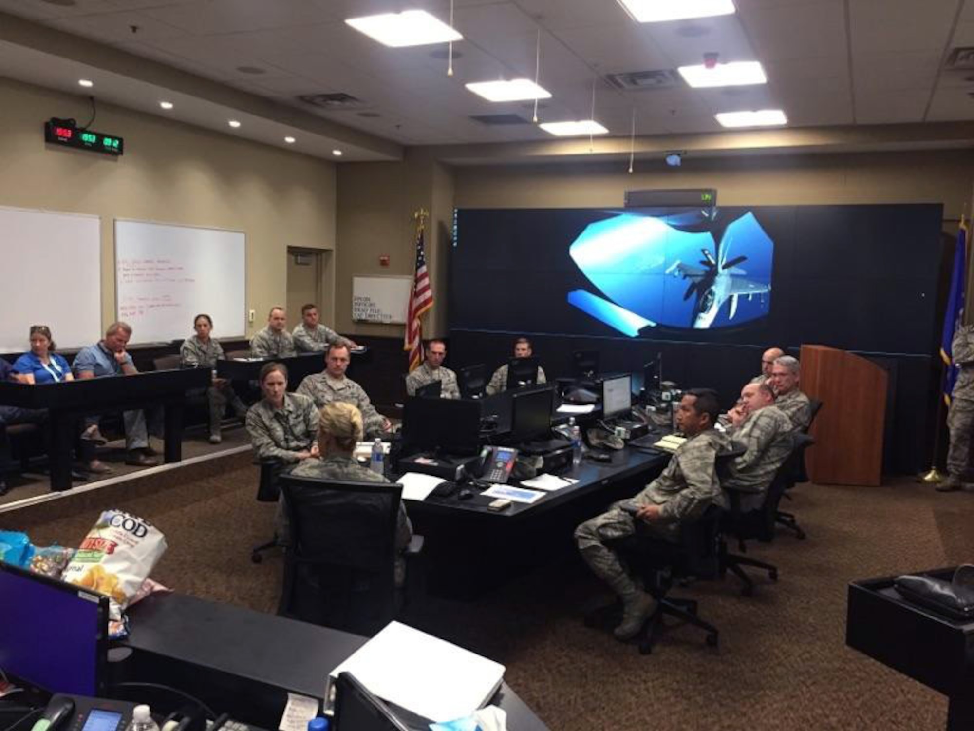 U.S. Air Force Col. April Vogel, commander of the 6th Air Mobility Wing, speaks to the Crisis Action Team at MacDill Air Force Base, Fla., Sept. 8, 2017.