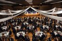 More than 400 Columbus Air Force Base members and community partners gather at the Trotter Convention Center in Columbus, Mississippi, Sept. 15, 2017, to celebrate the Air Force’s 70th birthday. The Trotter Convention Center lobby was lined with a historical display that featured some of the Air Force’s and the base’s key points in its existence and supported the ball’s theme, “Airpower Starts Here.” The event also included a Prisoner of War and Missing in Action remembrance ceremony, formal toasts to leaders of the military services, a ceremonial cake cutting, and music performed live by the 41st Army Band. (U.S. Air Force photo by Melissa Doublin)