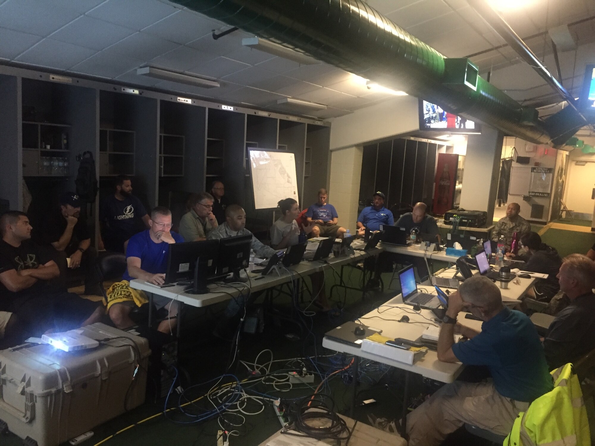 The MacDill Hurricane Irma ride-out team monitors operations at Raymond James Stadium, Tampa, Fla., Sept. 10, 2017. The team maintained communication between wing leadership, Hillsborough County and the City of Tampa, as well as created and later implemented a tactical recovery plan for MacDill. (Courtesy photo)
