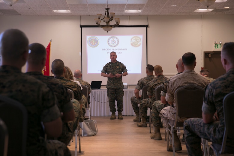 Col. Ricardo Martinez, chief of staff, speaks at the Suicide Prevention Symposium, held aboard the Combat Center, September 19, 2017. The symposium,  organized by the behavioral health branch of Marine Corps Community Services, provided Combat Center leadership with information and resources to aid in dealing with mental health and suicide prevention. (U.S. Marine Corps photo by Lance Cpl. Isaac Cantrell)
