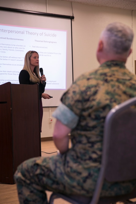 Stacie Coduto, behavioral health branch head, Marine Corps Community Services, speaks to Combat Center leadership during the Suicide Prevention Symposium, held aboard the Combat Center, September 19, 2017. The symposium,  organized by the behavioral health branch of MCCS, provided Combat Center leadership with information and resources to aid in dealing with mental health and suicide prevention. (U.S. Marine Corps photo by Lance Cpl. Isaac Cantrell)