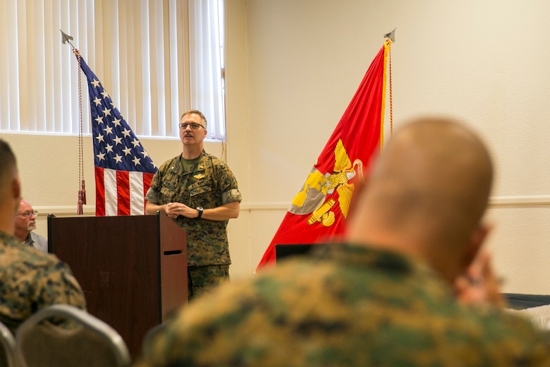 Cmdr. Bill Middleton, chaplain, Religious Ministries, gives a speech during the Suicide Prevention Symposium, held aboard the Combat Center, September 19, 2017. The symposium,  organized by the behavioral health branch of Marine Corps Community Services, provided Combat Center leadership with information and resources to aid in dealing with mental health and suicide prevention. (U.S. Marine Corps photo by Lance Cpl. Isaac Cantrell)