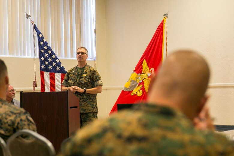 Cmdr. Bill Middleton, chaplain, Religious Ministries, gives a speech during the Suicide Prevention Symposium, held aboard the Combat Center, September 19, 2017. The symposium,  organized by the behavioral health branch of Marine Corps Community Services, provided Combat Center leadership with information and resources to aid in dealing with mental health and suicide prevention. (U.S. Marine Corps photo by Lance Cpl. Isaac Cantrell)