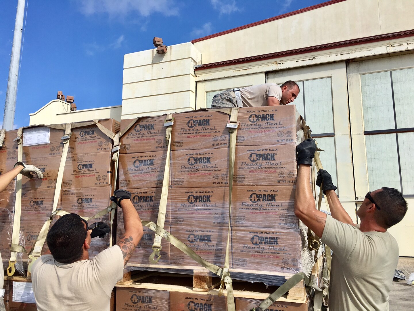 Airman from the 502nd Logistics Readiness Squadron and 26th Aerial Port Squadron finalize relief supply pallets for air transport Sept. 22, 2017 at Joint Base San Antonio-Kelly Field.  The supplies were being staged at the Federal Emergency Management Agency’s Incident Support Base at Kelly for transport to areas devastated by Hurricane Maria (U.S. Air Force image/Dan Hawkins)