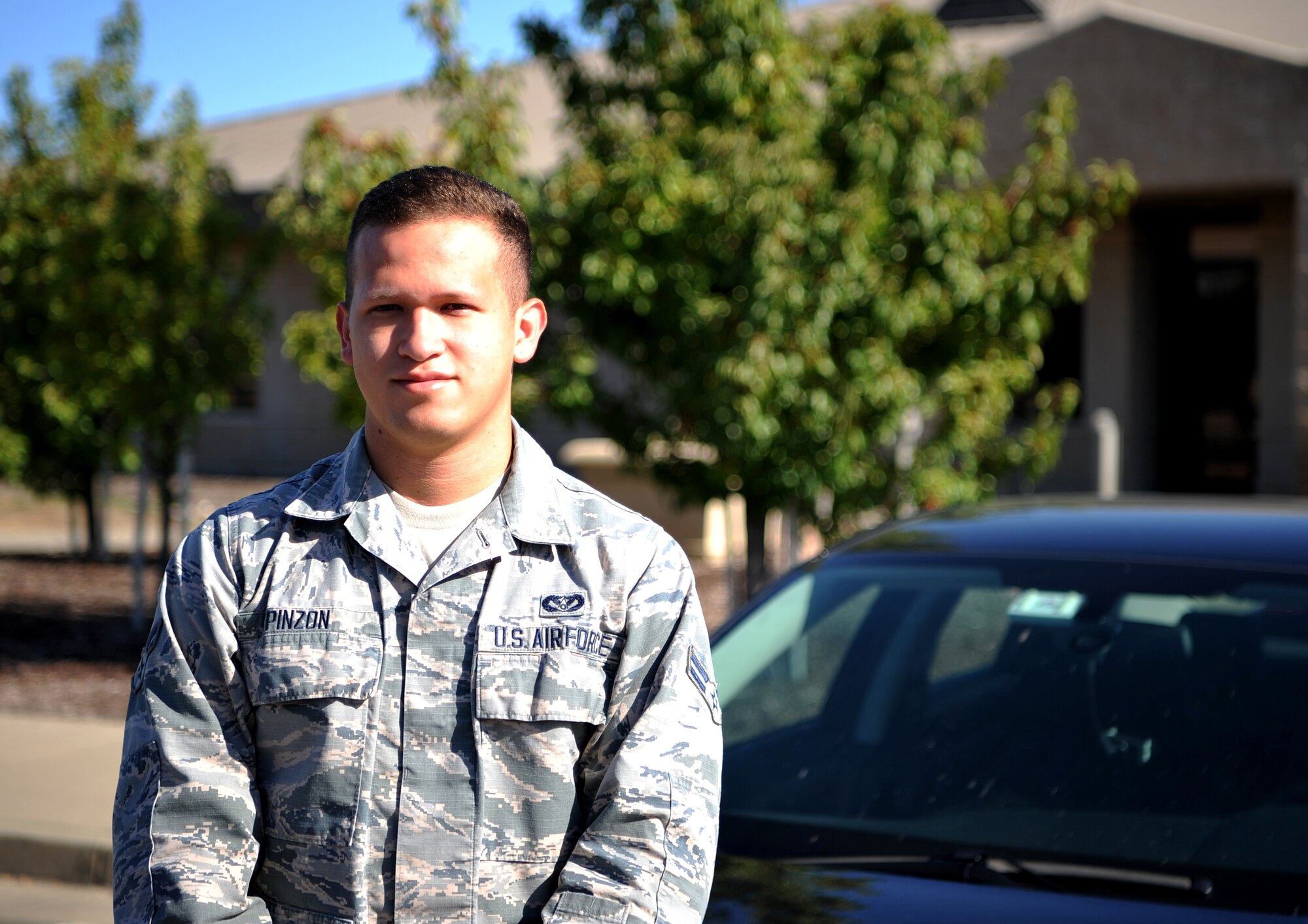 Airman 1st Class Santiago Pinzon,9th Civil Engineer Squadron heating, ventilation, and air conditioning technician poses for a photo
