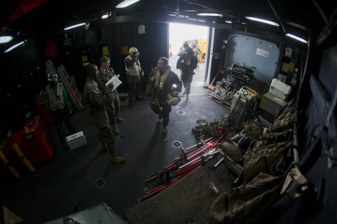 U.S. Marines with the 26th Marine Expeditionary Unit (MEU), and Sailors with the amphibious assault ship USS Kearsarge (LHD 3), return from a key leader engagement with representatives from the Federal Emergency Management Agency (FEMA) and the Puerto Rico National Guard, Caribbean Sea, Sept. 22, 2017. The 26th MEU brings diverse capabilities and is positioned in the region awaiting tasking to support FEMA, the lead federal agency, in helping those affected by Hurricane Maria to minimize suffering and is one component of the overall whole-of-government response effort. (U.S. Marine Corps photo by Lance Cpl. Alexis C. Schneider)