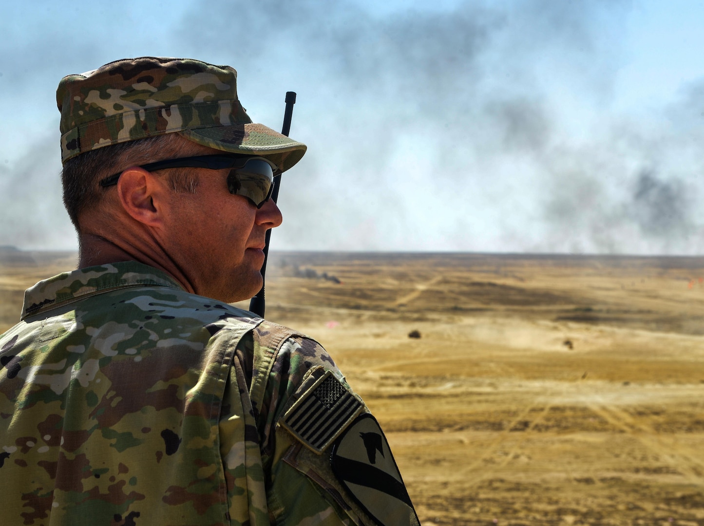 U.S. Army Lt. Col. William Wade, 2nd Battalion, 7th Cavalry Regiment, 3rd Armored Combat Team, 1st Cavalry Division battalion, watches the conclusion of a combined arms live fire exercise during Bright Star 2017, Sept. 20, 2017, at Mohamed Naguib Military Base, Egypt. Bright Star was last held in 2009 with more than 15 countries and 15,000 participants. (U.S. Air Force photo by Staff Sgt. Michael Battles)