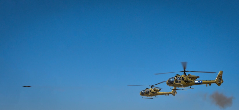 Two Egyptian Aérospatiale Gazelle helicopters participate in a combined arms live fire exercise during Bright Star 2017, Sept. 20, 2017, at Mohamed Naguib Military Base, Egypt. More than 200 U.S. service members are participating alongside the Egyptian armed forces for the bilateral U.S. Central Command Exercise Bright Star 2017, Sept. 10 – 20, 2017. (U.S. Air Force photo by Staff Sgt. Michael Battles)