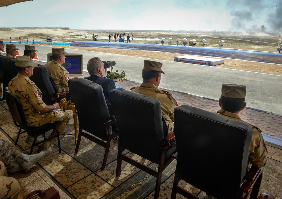 Thomas Goldberger, The U.S. Embassy’s Charge d’ Affaires to Egypt and senior U.S. and Egyptian leadership watch a combined arms live fire exercise during Bright Star 2017, Sept. 20, 2017, at Mohamed Naguib Military Base, Egypt. The bilateral exercise, Bright Star, targets strengthening military-to-military relationships between U.S. forces and its Egyptian partners in the CENTCOM area of responsibility. (U.S. Air Force photo by Staff Sgt. Michael Battles)