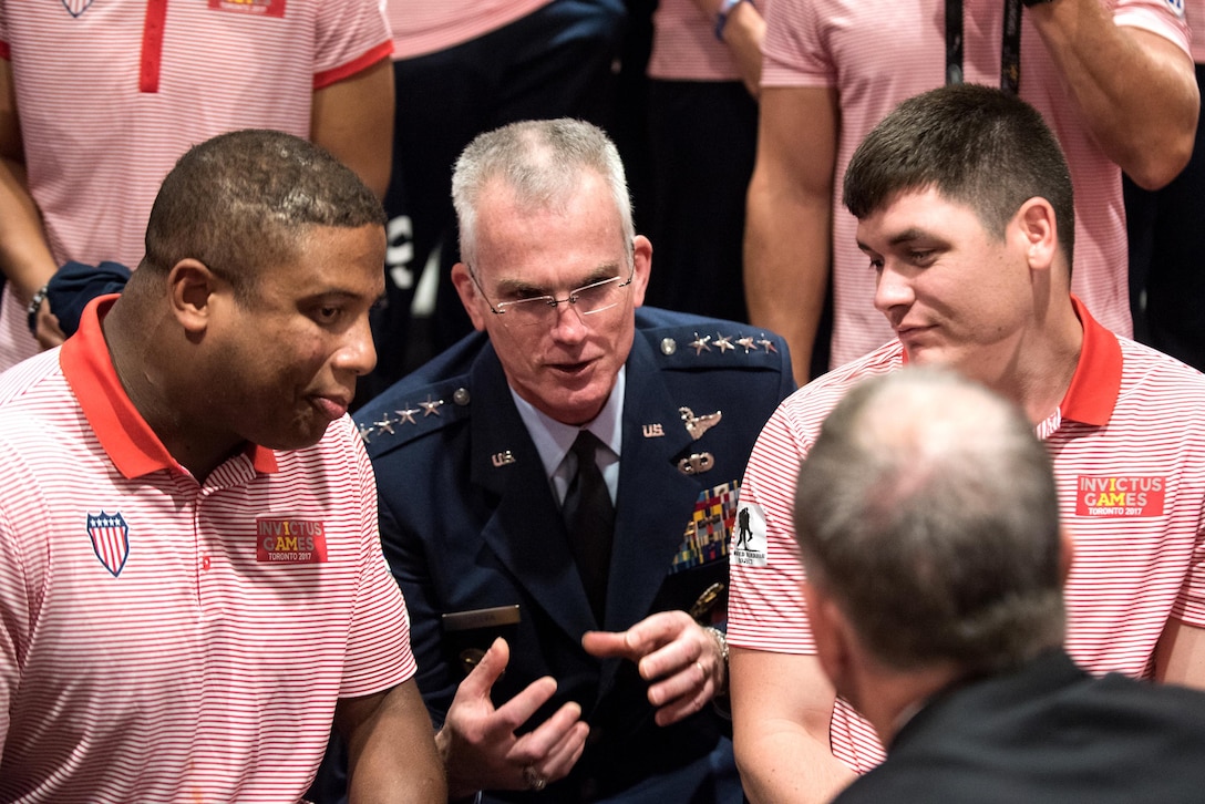 The vice chairman of the Joint Chiefs of Staff speaks to members of the U.S. team.