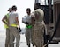 U.S. Air Force Senior Airman Yahya Elgazar, center, fuels distribution technician with the 379th Expeditionary Logistics Readiness Squadron, Fuels Management Flight, reviews the checklist at Al Udeid Air Base, Qatar, Sept. 14, 2017.