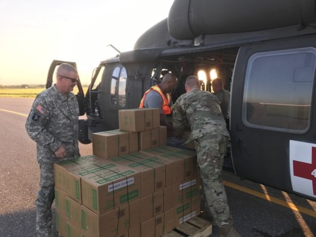 Members of the DLA Distribution Expeditionary team provided critical support to USNORTHCOM and FEMA by loading over 14,800 Commercial Meals and 11,760 liters of bottled water onto Texas National Guard and U.S. Border Patrol CH-47, UH-60, and UH-1 aircraft at Randolph Auxiliary Airfield in Seguin, Texas.