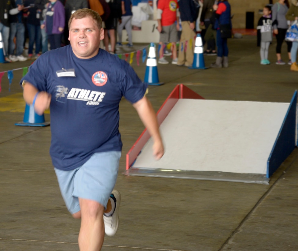 An athlete sprints down the ramp at the 36th Annual Joan Mann Special Sports Day Sept. 23, 2017, on RAF Mildenhall, England. Joan Mann, a former Ministry of Defense employee at RAF Mildenhall, developed the event as a way to bring civilian and military communities closer together while supporting those with special needs. (U.S. Air Force photo by Airman 1st Class Benjamin Cooper)