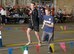 Athletes at the 36th Annual Joan Mann Special Sports Day race against each other in the 100-yard dash September 23, 2017, on RAF Mildenhall, England. Joan Mann, a former Ministry of Defense employee at RAF Mildenhall, developed the event as a way to bring civilian and military communities closer together while supporting those with special needs. (U.S. Air Force photo by Airman 1st Class Benjamin Cooper)