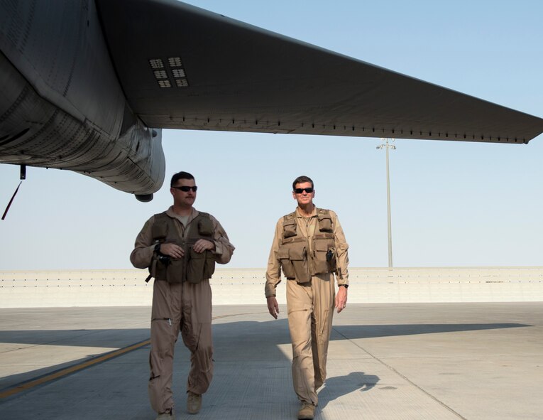 U.S. Army Gen. Joseph Votel, right, U.S. Central Command commander, conducts a pre-flight inspection of a B-52 Stratofortress with U.S Air Force Capt. Micah McCracken, 69th Expeditionary Bomb Squadron aircraft commander, at Al Udeid Air Base, Qatar, Sept. 8, 2017.
