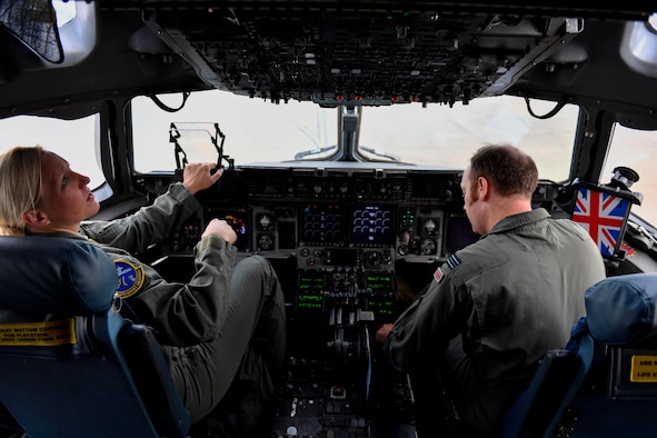 Maj. Kari Flemming, left, 14th Airlift Squadron pilot, and Flight Lt. Matt Jenkinson, right, 14th AS Royal air force exchange pilot, both from Joint Base Charleston, S.C., perform preflight checks at Kelly Field in San Antonio, Texas, Sept. 24, 2017. Members of the 14th AS delivered more than 129,000 pounds of food and water to St. Croix, Virgin Islands in support of relief efforts after Hurricane Maria. The mission to St. Croix marked the second mission the crew flew to the Virgin Islands for humanitarian aid in 48 hours.