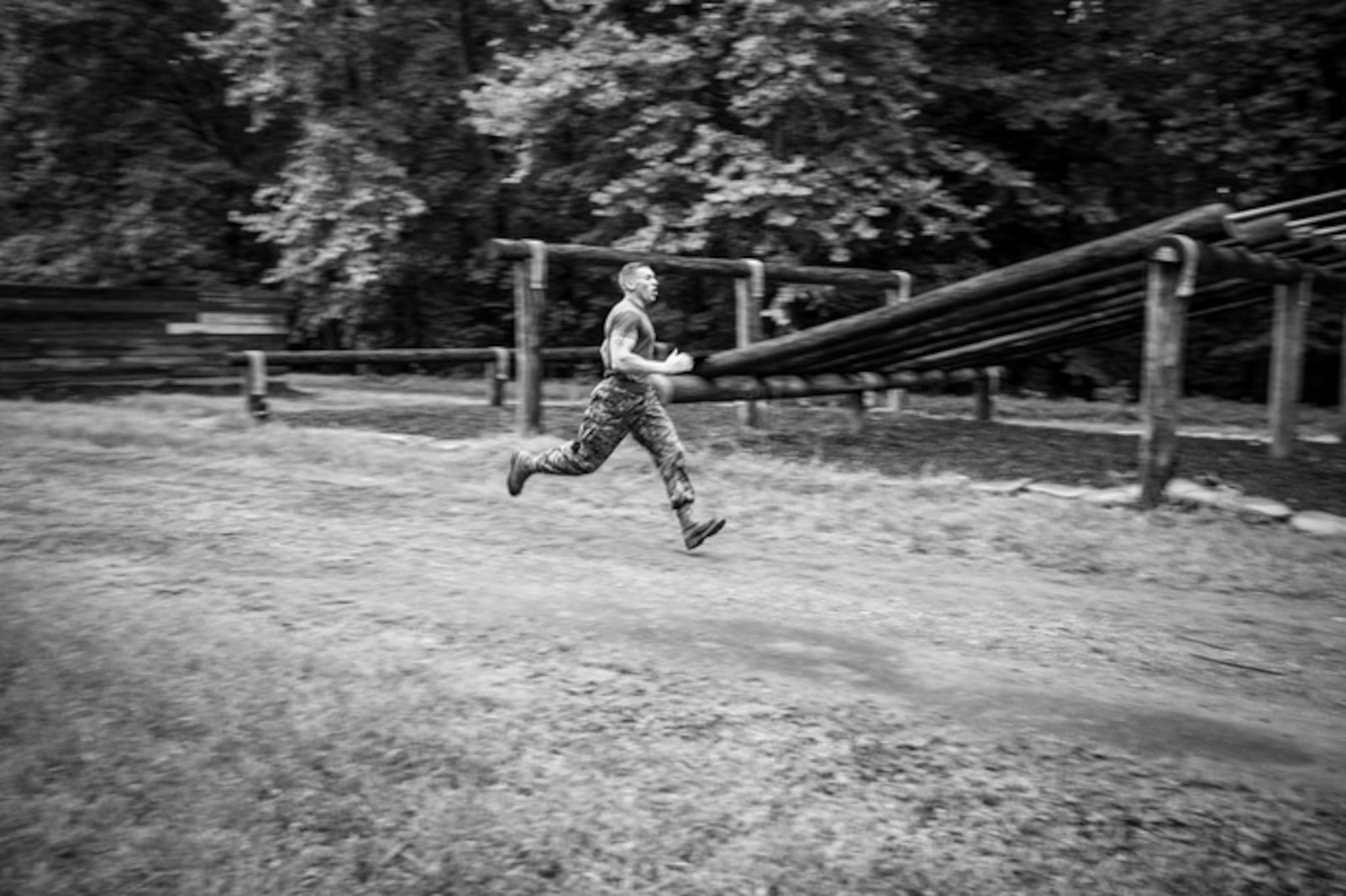 A Marine sprints as part of a Endurance Course / Obstacle Course Physical Training Session during Force Fitness Instructor Course 4-17.