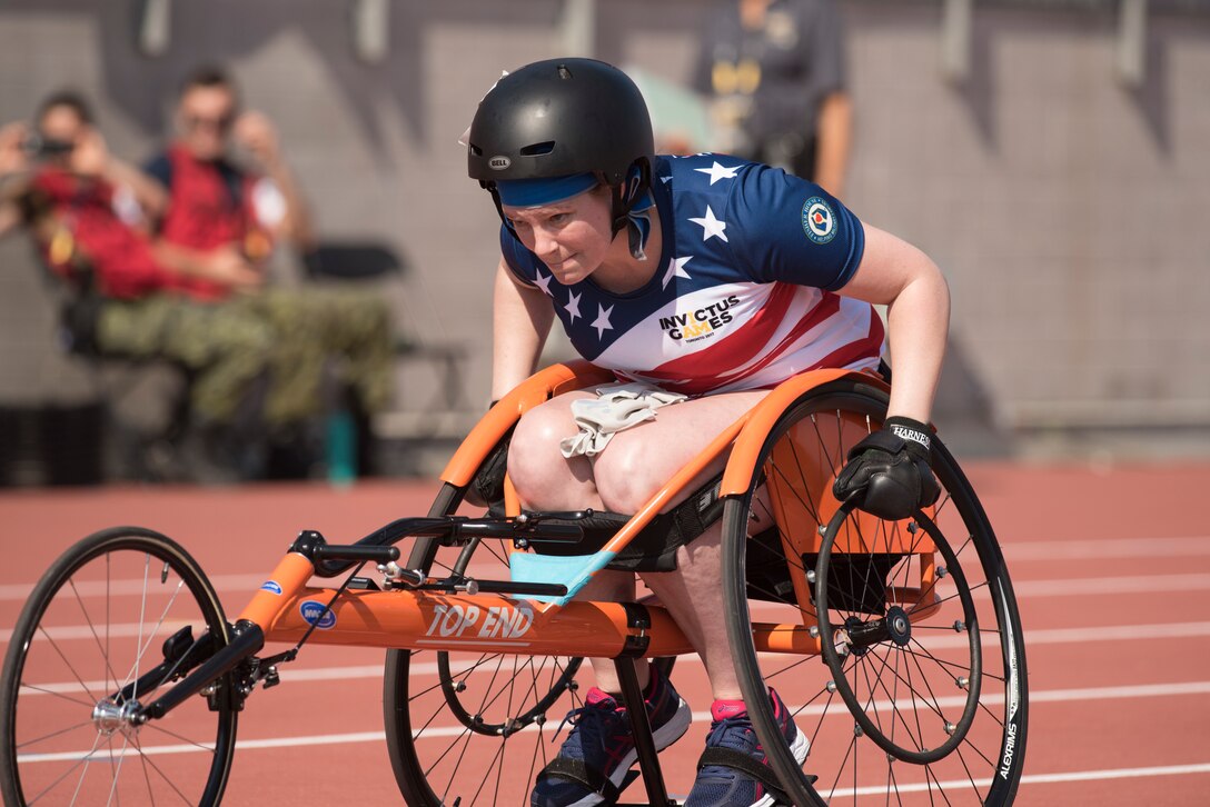 An Air Force veteran competes in wheelchair racing.