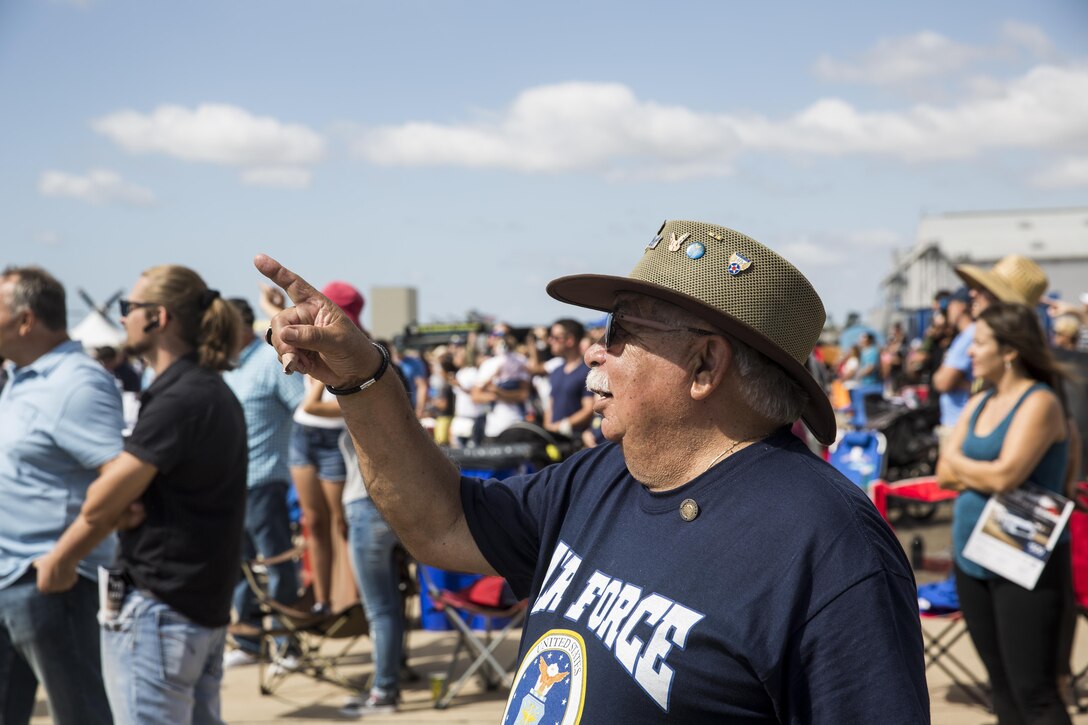 Richard Barragan, a retired airman who served during the Vietnam War, watches the U.S. Navy Blue Angels performance during the 2017 Marine Corps Air Station Miramar Air Show at MCAS Miramar, Calif., Sept. 23. The theme for the air show is “A Salute to Vietnam Veterans” and featured several performances and displays to recognizing the sacrifices of Vietnam veterans. “The 2017 MCAS Miramar Air Show gives the public and current service members an opportunity to say thank you to the veterans of the Vietnam War,” said Col. Jason Woodworth, commanding officer of MCAS Miramar. “Our goal is to remind the veterans that the country cares about them and truly values the sacrifice they made for the American people, regardless of how they were treated when they initially returned from Vietnam.”  (U.S. Marine Corps photo by Sgt. Lillian Stephens/Released)
