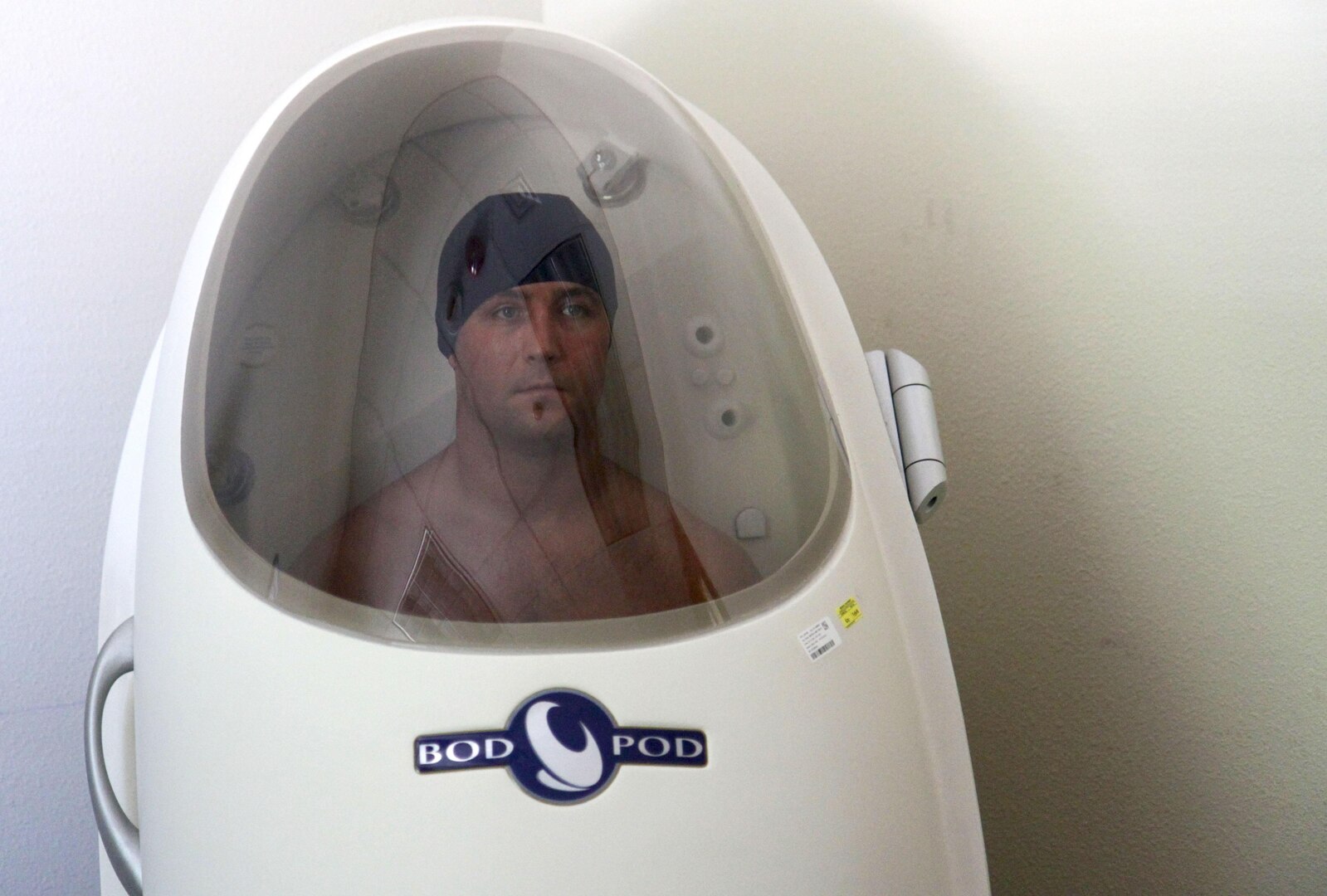 Staff Sgt. Jody McIlroy, a signal intelligence analyst with Headquarters and Headquarters Battalion, U.S. Army North (Fifth Army), Joint Base San Antonio-Fort Sam Houston, measures his body fat composition inside the BOD POD Gold Standard Body Composition Tracking System at the Army Wellness Center to prepare for the upcoming Best Warrior Competition at Fort A.P. Hill, Va., Sept. 30-Oct. 6. BWC is an annual, Army-wide event in which Soldiers engage in friendly competition throughout a variety of challenges.