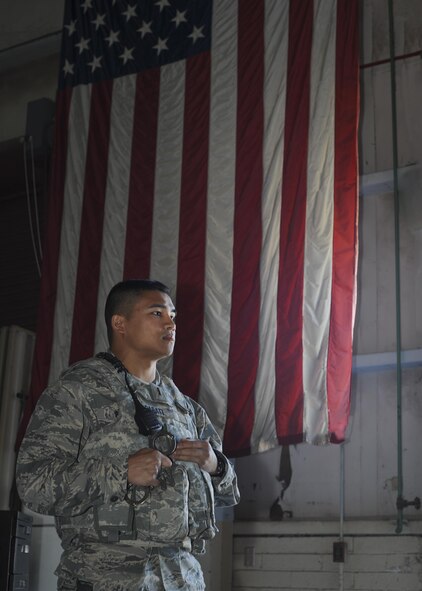 U.S. Air Force 2nd Lt. Robert Parati, 355th Security Forces Squadron flight commander, prepares to brief new 355th SFS Airmen on the procedure to handcuff suspects at Davis-Monthan Air Force Base, Ariz., June 12, 2017. If done properly, the positions the perpetrators are put into limits movement, giving the defender the upper hand in any situation. (U.S. Air Force photo by Senior Airman Ashley N. Steffen)