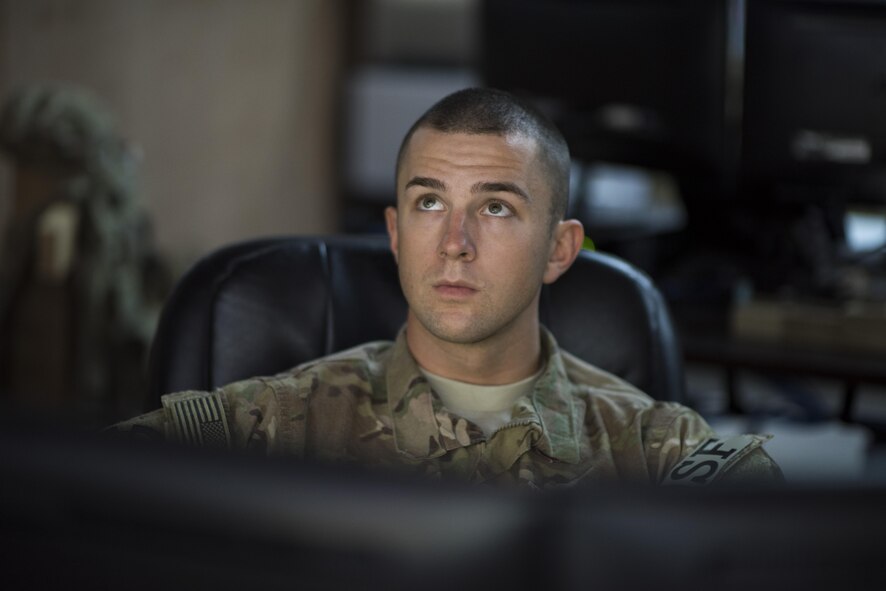 U.S. Air Force Airman 1st Class Cole Donnelly, 332nd Expeditionary Security Forces Squadron tactical automated sensor system operator, tracks and records a suspicious vehicle outside the installation, July 12, 2017, in Southwest Asia. From the joint defense operations center, security forces Airmen work with Coalition Partners to coordinate with base organizations to combat threats and respond to emergencies. (U.S. Air Force photo/Senior Airman Damon Kasberg)