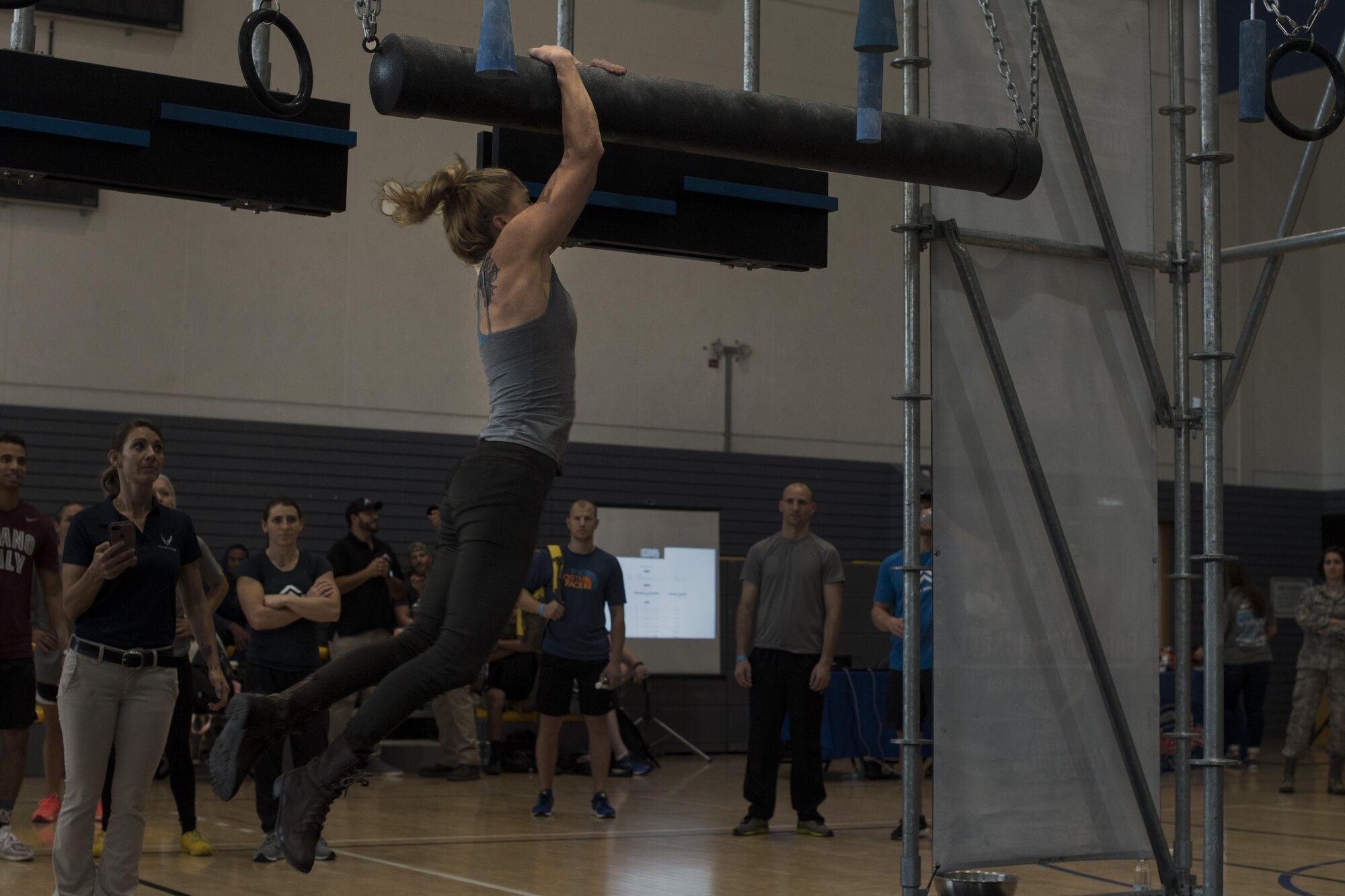 U.S. Air Force Staff Sgt. Brina Rustand, 86th Munitions Squadron munitions inspector, leaps onto a battering ram on the Alpha Warrior’s Battle Rig obstacle course during the Alpha Warrior regional competition on Ramstein Air Base, Germany, Sept. 23, 2017. Rustand was the top female competitor to complete the course and will move on to the championship in San Antonio, Texas, in November 2017. (U.S. Air Force photo by Senior Airman Tryphena Mayhugh)