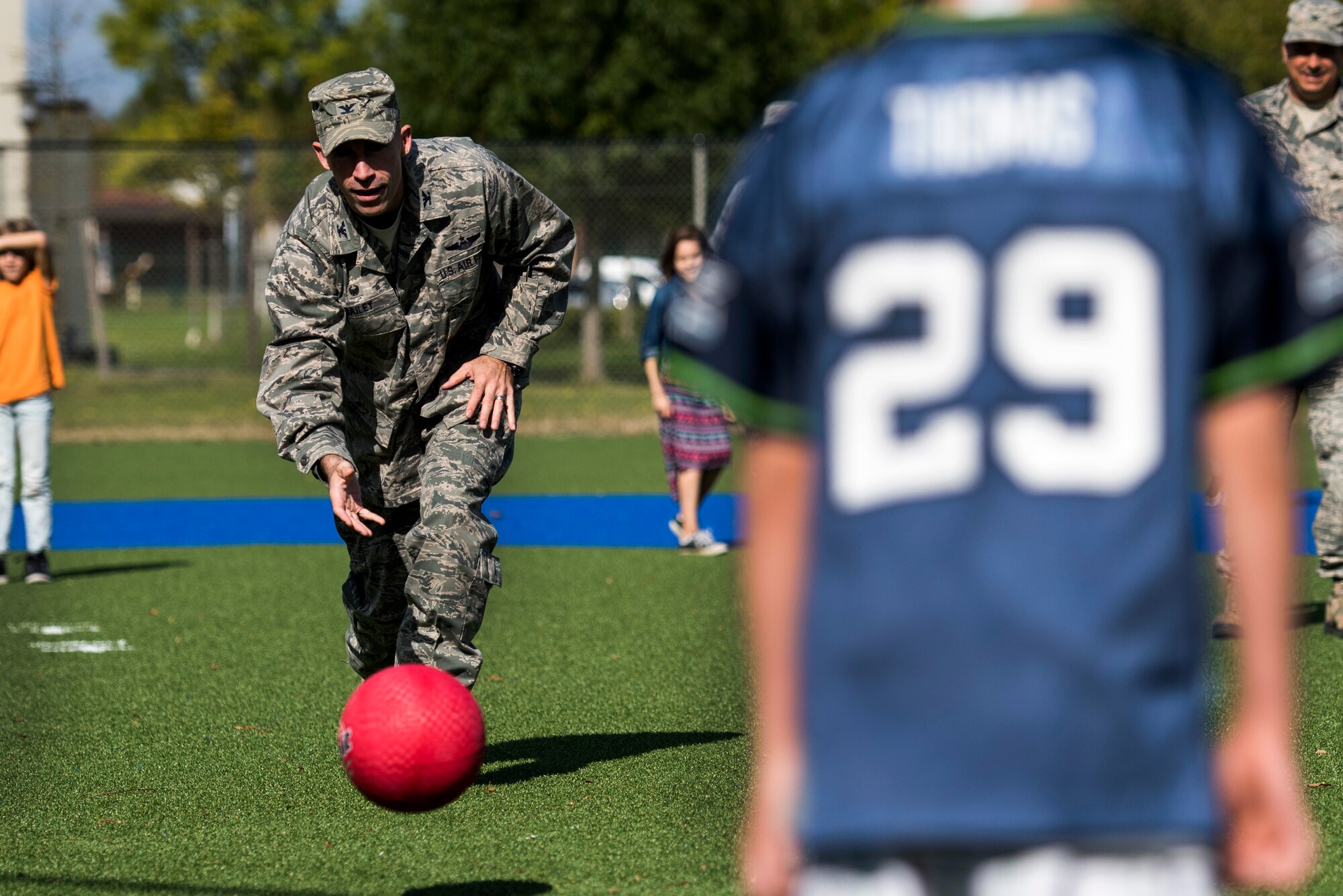 Saber Children, Leadership play ball at newly renovated Falcon Field