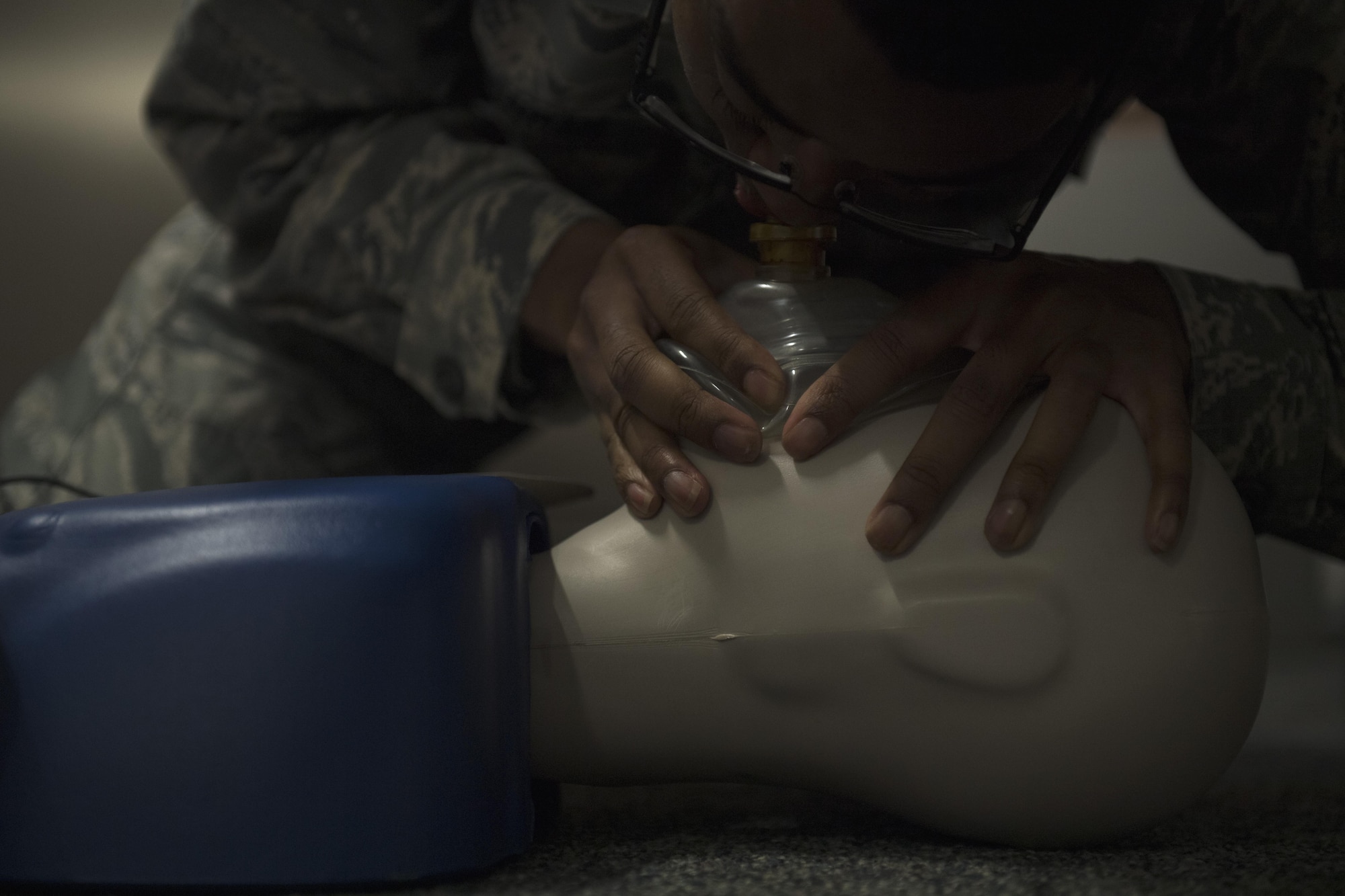 U.S. Air Force Airman 1st Class Kenyatta Zimmerman, 786th Civil Engineer Squadron electrical systems apprentice, performs CPR on a dummy during the 86 CEG Prime Base Engineer Emergency Force training day on Ramstein Air Base, Germany, Sept. 21, 2017. The Prime BEEF training day included CPR, night vision goggles, Humvee, tent assembly, and heating, ventilation, and air conditioning training. (U.S. Air Force photo by Senior Airman Tryphena Mayhugh)