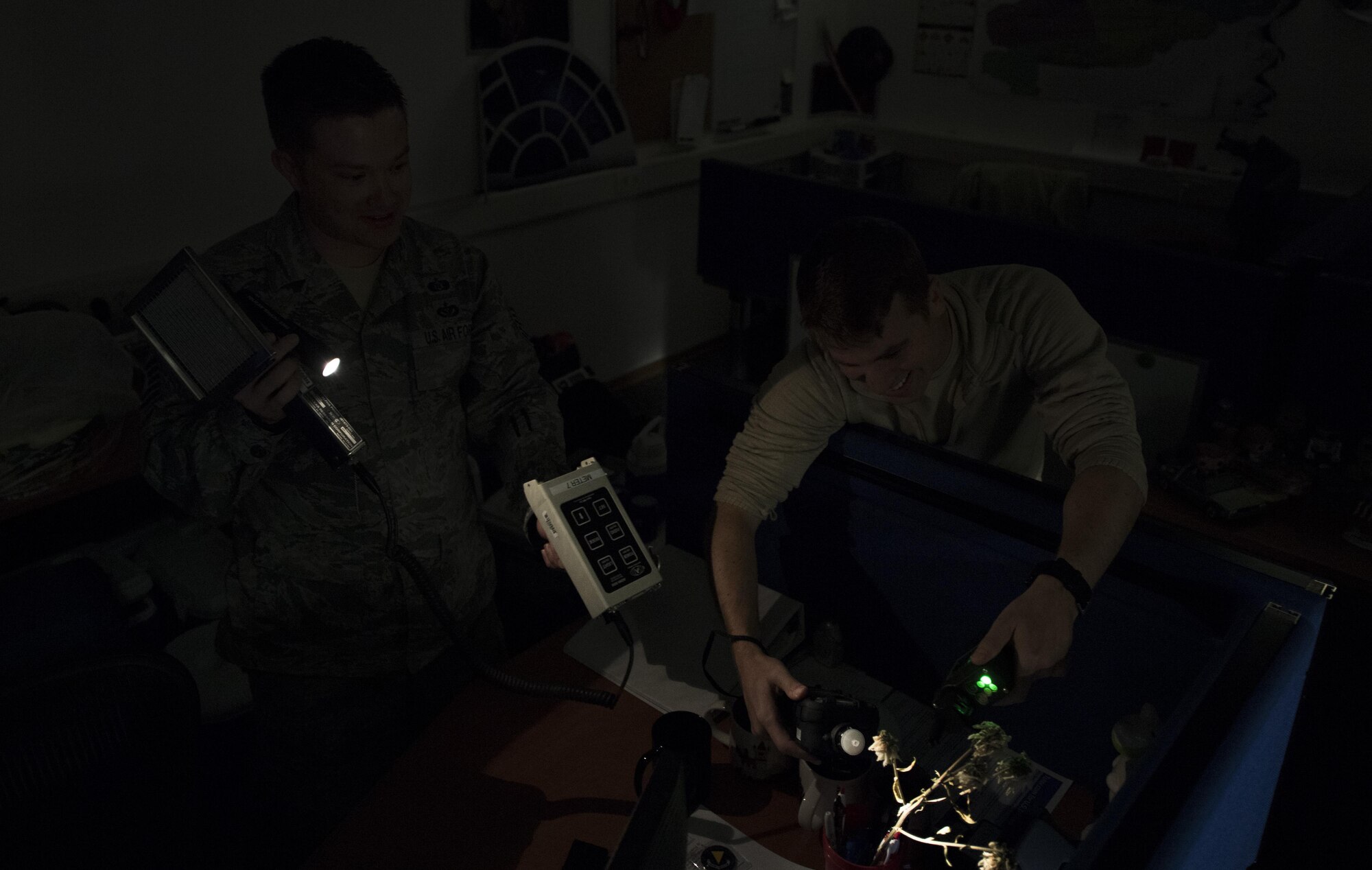 U.S. Air Force Tech. Sgt. Jacob Sargent, 786th Civil Engineer Squadron noncommissioned officer in charge of emergency management standards and evaluations (left), and U.S. Air Force Senior Airman Benjamin Thompson, 786th CES emergency management and operations specialist, use equipment to detect chemical agents, radiation, or other substances during the 86 CEG Prime Base Engineer Emergency Force training day on Ramstein Air Base, Germany, Sept. 21, 2017. The purpose of the Prime BEEF training day is to train the 86th CEG Airmen in the skills they will need while deployed.  (U.S. Air Force photo by Senior Airman Tryphena Mayhugh)