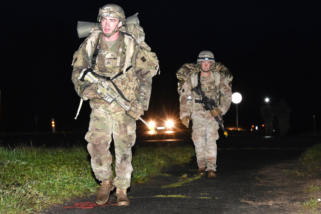 Sgt. Jacob Rickert participates in a 12-mile ruck march.