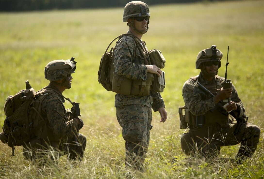 Marines prepare to board a helicopter as part of a reconnaissance mission during a field training exercise at Camp Lejeune, N.C., Sept. 17-2, 2017. The field exercise prepares Marines for future deployments though events including engineer reconnaissance, helicopter operations, improvised explosive device lanes with route clearing courses, survivability tasks, breeching, and urban operations. The Marines are with 2nd Combat Engineer Battalion. (U.S. Marine Corps photo by Lance Cpl. Gloria Lepko)