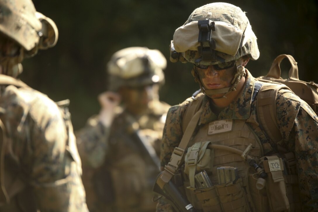 A Marine prepares to board a helicopter as part of a reconnaissance mission during a field training exercise at Camp Lejeune, N.C., Sept. 17-21, 2017. The field exercise prepares Marines for future deployments though events including engineer reconnaissance, helicopter operations, improvised explosive device lanes with route clearing courses, survivability tasks, breeching, and urban operations. The Marines are with 2nd Combat Engineer Battalion. (U.S. Marine Corps photo by Lance Cpl. Gloria Lepko)