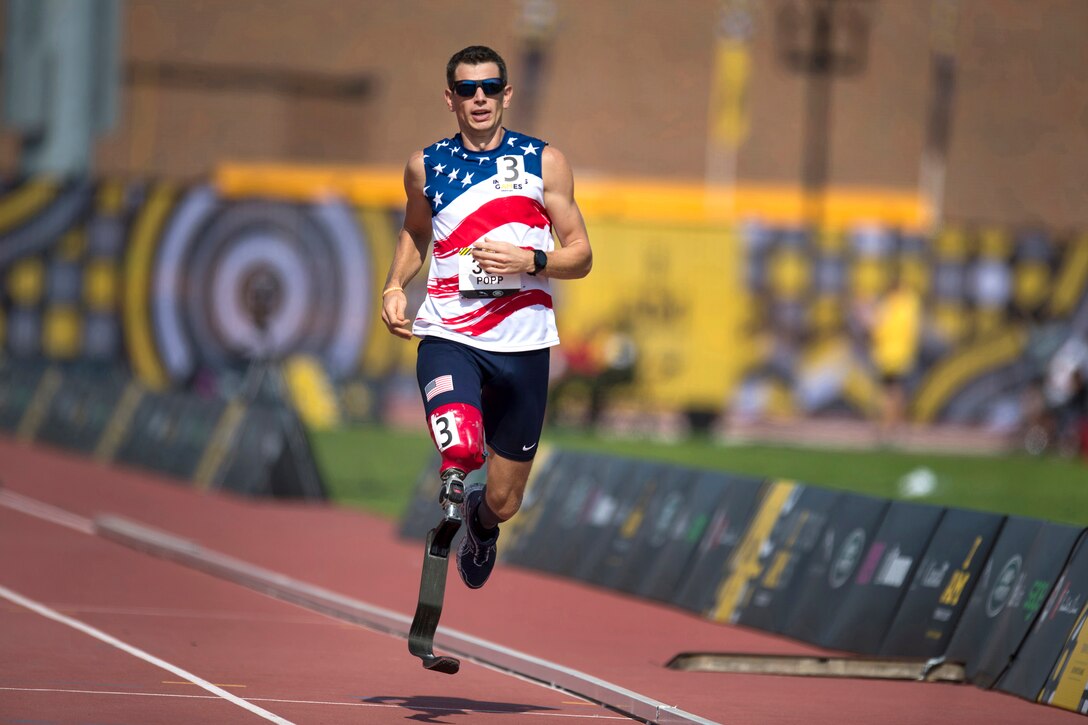 Sgt. Adam Popp participates in one of the sprinting events during the finals of track and field part of the Invictus Games 2017.