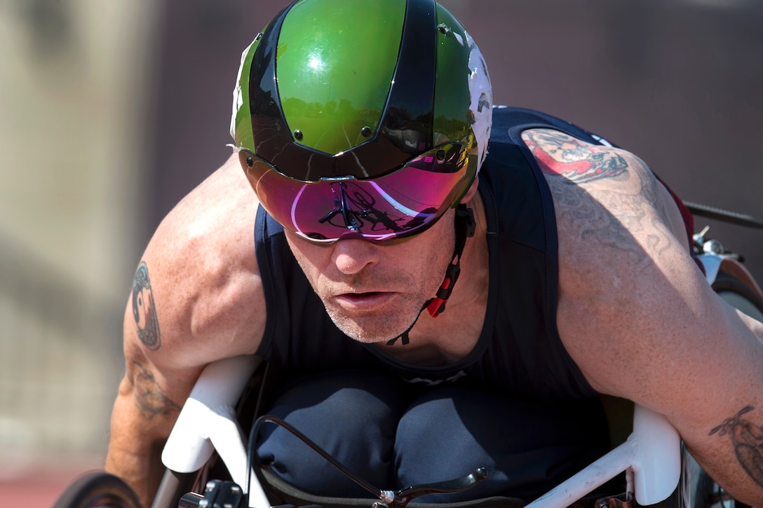 The track reflects in Britain’s wheelchair racer Andrew Bracey’s goggles during the finals of track and field.