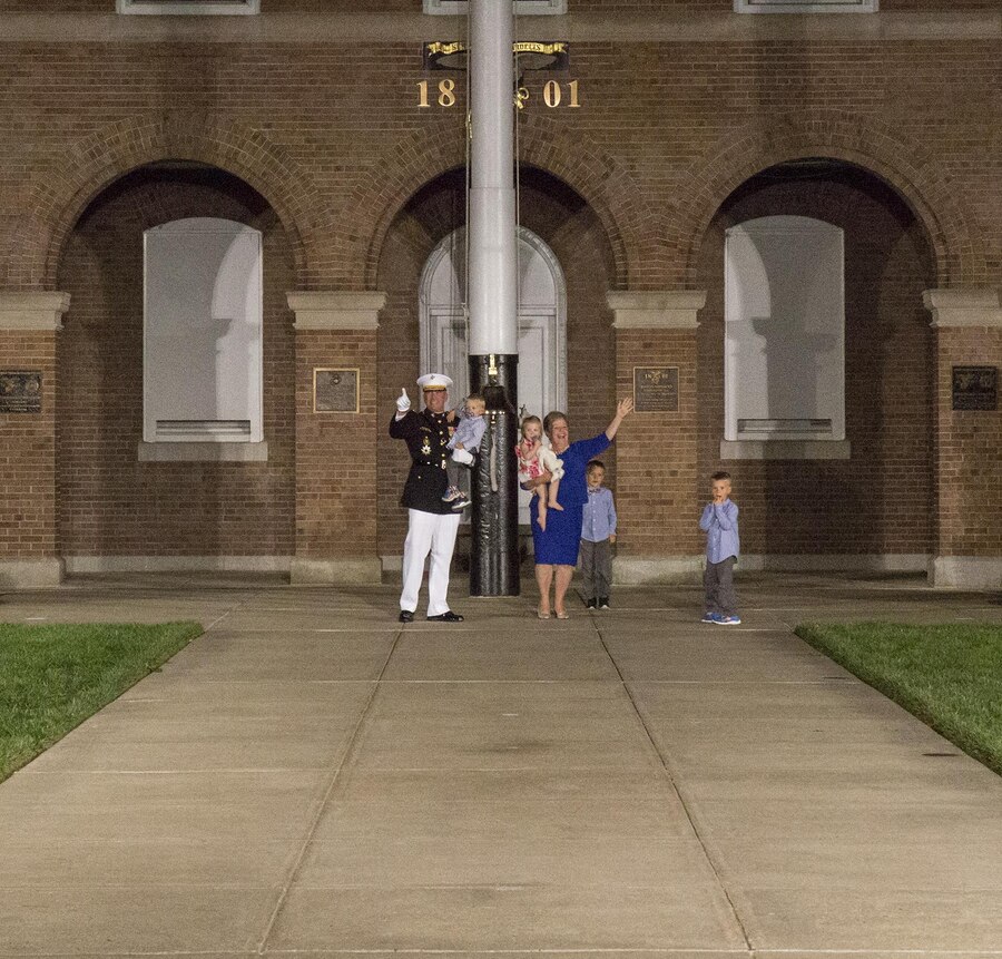 Lieutenant Gen. John E. Wissler, outgoing commander of Marine Corps Forces Command, his wife Susan Wissler, and four grandchildren exit the parade deck at the conclusion of a retirement ceremony for Lt. Gen. Wissler at Marine Barracks Washington D.C., Sept. 22, 2017. Before Marine Corps Forces Command, Wissler served as commanding general of III Marine Expeditionary Force. He is retiring after 39 dedicated years of service to the Corps. (Official Marine Corps photo by Cpl. Robert Knapp/Released)