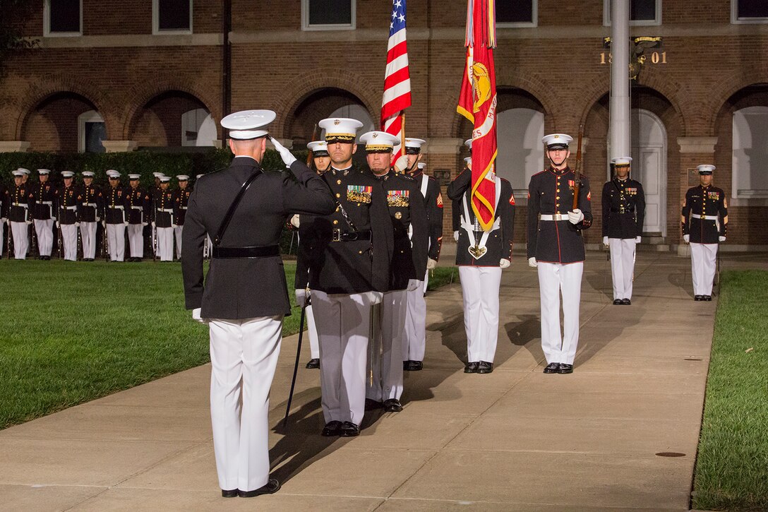 General Joseph F. Dunford, 16th Chairman of the Joint Chiefs of Staff, and Maj. Eric P. Roby, parade commander, render salutes during a retirement ceremony for Lt. Gen. John E. Wissler at Marine Barracks Washington D.C., Sept. 22, 2017. Before Marine Corps Forces Command, Wissler served as commanding general of III Marine Expeditionary Force. He is retiring after 39 dedicated years of service to the Corps. (Official Marine Corps photo by Cpl. Robert Knapp/Released)