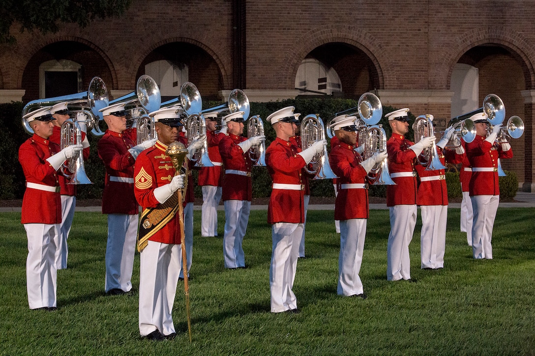 Marines with “The Commandant’s Own” U.S. Marine Drum & Bugle Corps perform musical ballads during a retirement ceremony for Lt. Gen. John E. Wissler, outgoing commander of Marine Corps Forces Command, at Marine Barracks Washington D.C., Sept. 22, 2017. Before Marine Corps Forces Command, Wissler served as commanding general of III Marine Expeditionary Force. He is retiring after 39 dedicated years of service to the Corps. (Official Marine Corps photo by Cpl. Robert Knapp/Released)