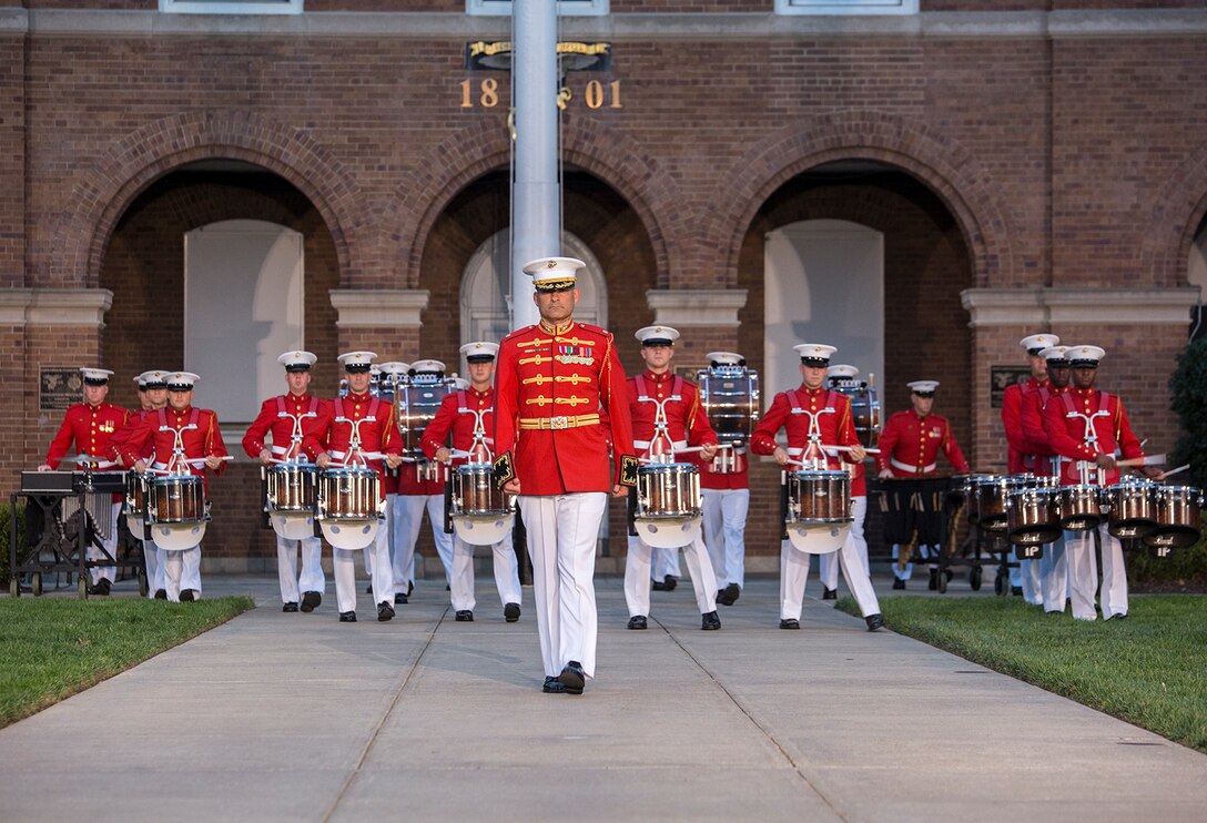 Major Christopher E. Hall, commanding officer, “The Commandant’s Own” U.S. Marine Drum & Bugle Corps, marches the D&B onto the parade deck during a retirement ceremony for Lt. Gen. John E. Wissler, outgoing commander of Marine Corps Forces Command, at Marine Barracks Washington D.C., Sept. 22, 2017. Before Marine Corps Forces Command, Wissler served as commanding general of III Marine Expeditionary Force. He is retiring after 39 dedicated years of service to the Corps. (Official Marine Corps photo by Cpl. Robert Knapp/Released)