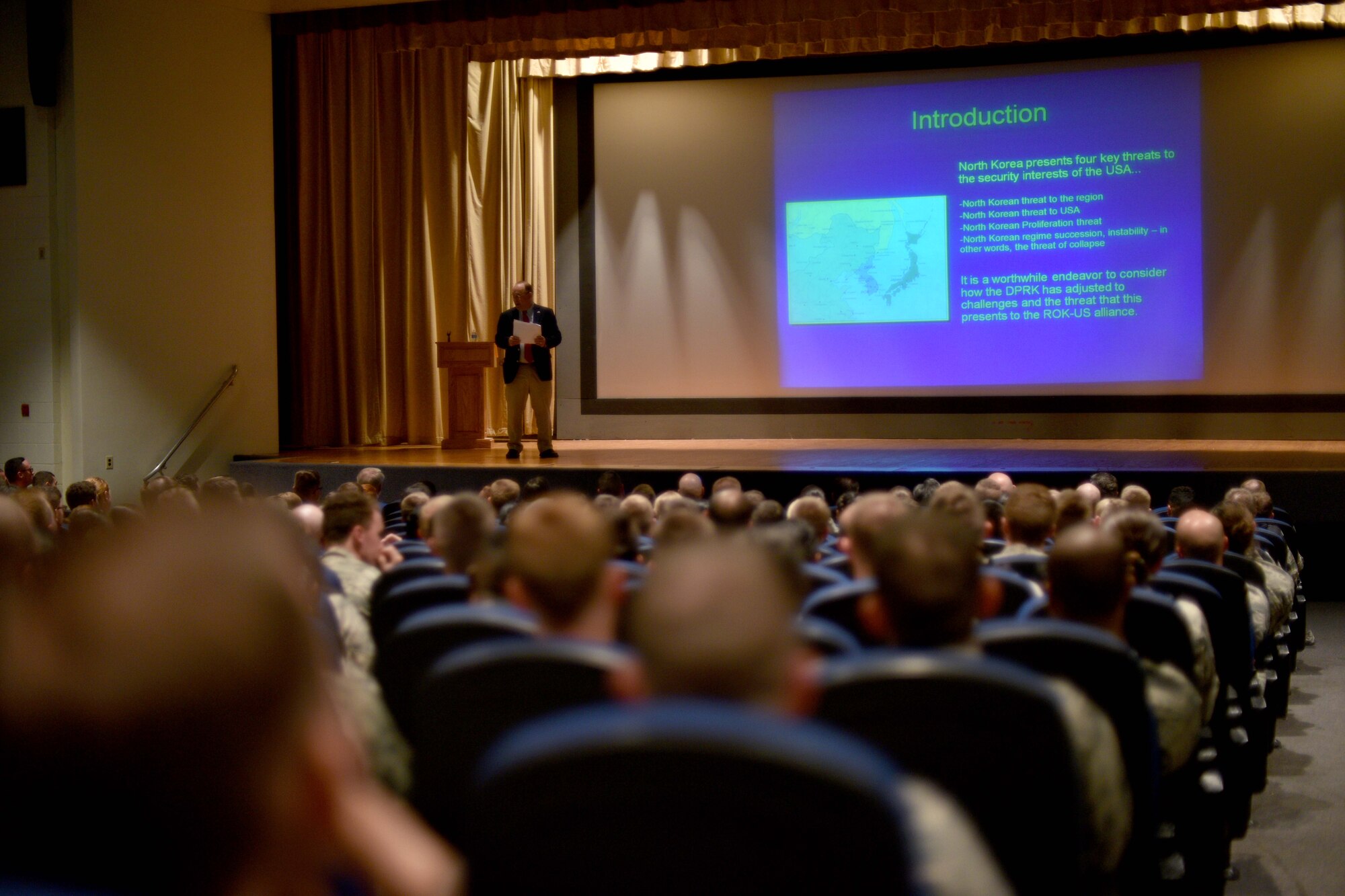 Dr. Bruce Bechtol, Angelo State University political science professor, gives a presentation in the Base Theater on Goodfellow Air Force Base, Texas, Sept. 22, 2017. Bechtol discussed national security issues that the intelligence community faces now and in the future. (U.S. Air Force photo by Airman 1st Class Randall Moose/Released)