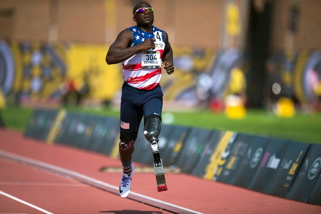 Army Capt. William Reynolds participates in one of the sprinting events during the finals of track and field.