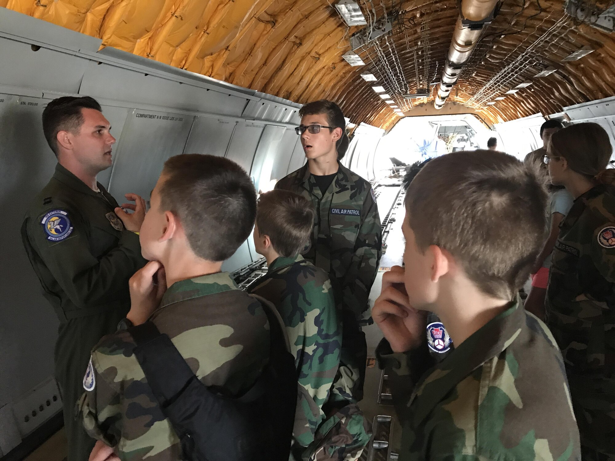 A KC-10 Extender pilot with the 6th Air Refueling Squadron at Travis Air Force Base, Calif. talks with the Gettysburg Composite Squadron 308 at the 2017 open house and airshow at Joint Base Andrews, Md. While at the airshow, the cadets were exposed to several science, technology, engineering and math booths run by active duty military personnel, NASA, the U.S. Air Force Academy and the USAF Office of Special Investigations. (U.S. Air Force photo)