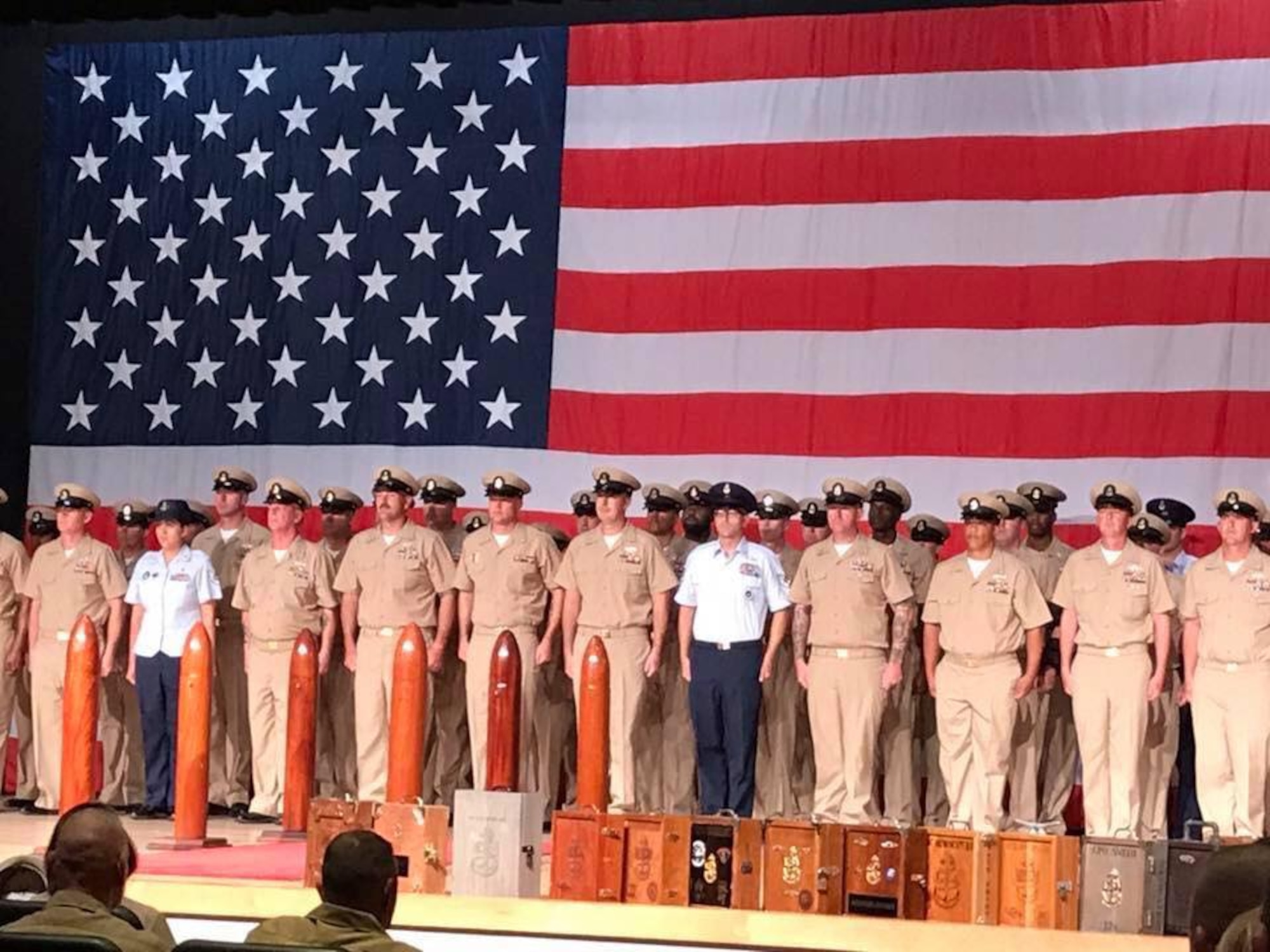 Military members participate in the Navy Chief Petty Officer Course graduation Sept. 15, 2017, on Naval Construction Battalion Center, Mississippi. The six-week long Navy Chief Petty Officer Courses held at Keesler and the Naval Construction Battalion Center in Gulfport, Mississippi included four Air Force members, which is the first time Keesler Air Force members have gone through this process. The course is meant to enhance leadership skills and to strengthen the Navy-Air Force enlisted leadership relationship on Keesler. (Courtesy photo)